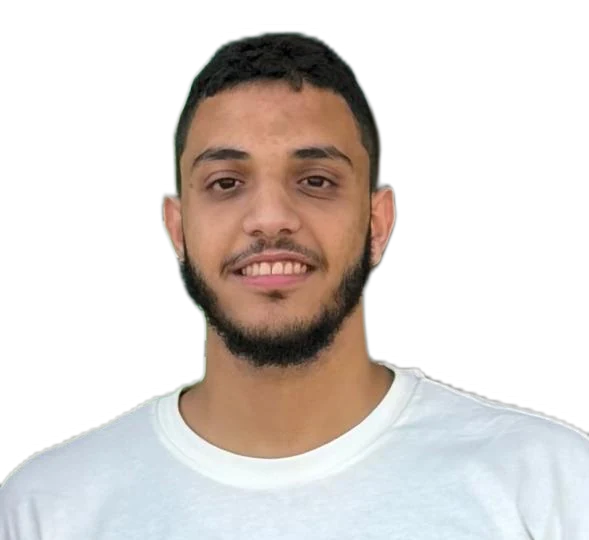 Portrait of Seif smiling, wearing a white t-shirt